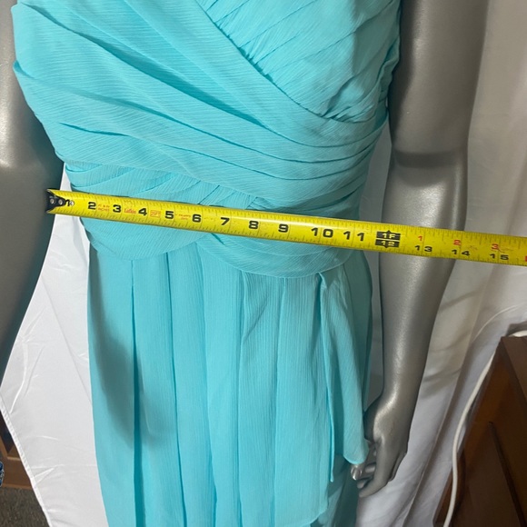 David’s Bridal Chiffon dress in aquamarine colour
Size 16 - Picture 5 of 5
